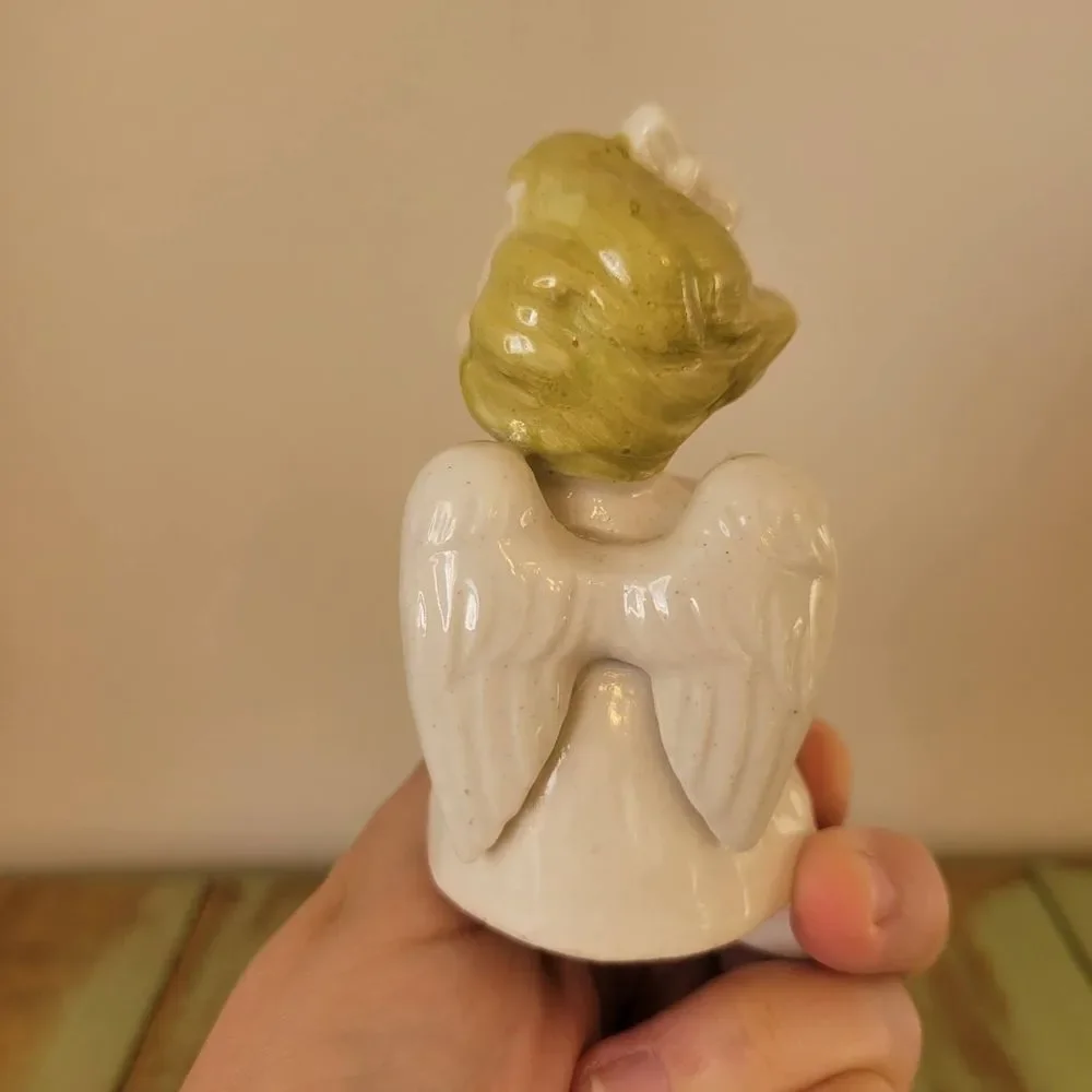 Ceramic Angel Figurine with Flowers